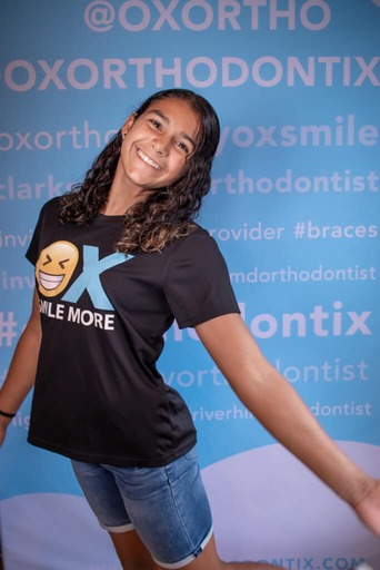 patient smiling at ox orthodontix office